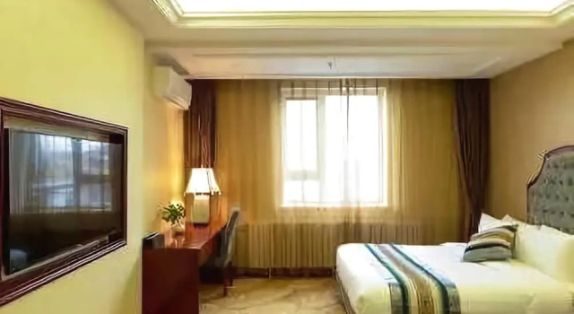 Riyueming Select Hotel, Boek Hotel Xigang District 
