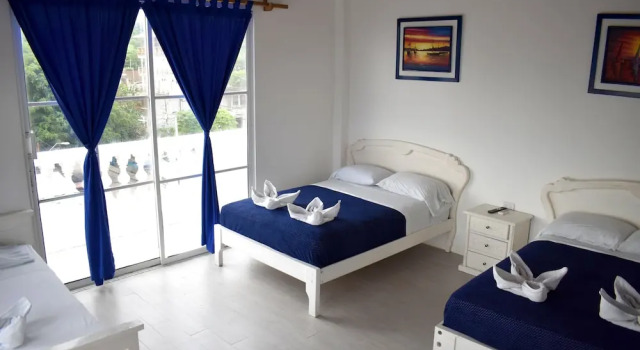Кровать в общем номере Rocio Boutique Hotel