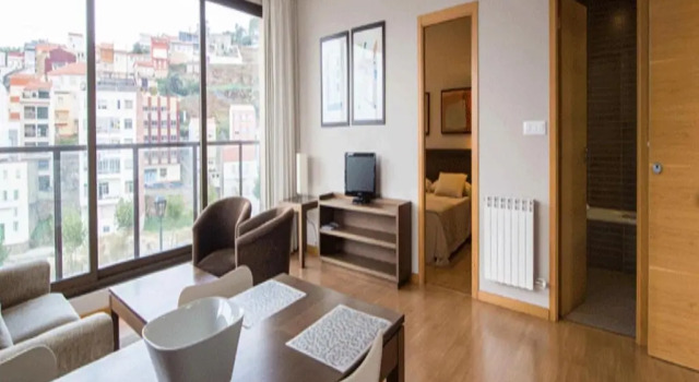 Апартаменты с частичным видом на море Apartamentos Turísticos Playa de Osmo
