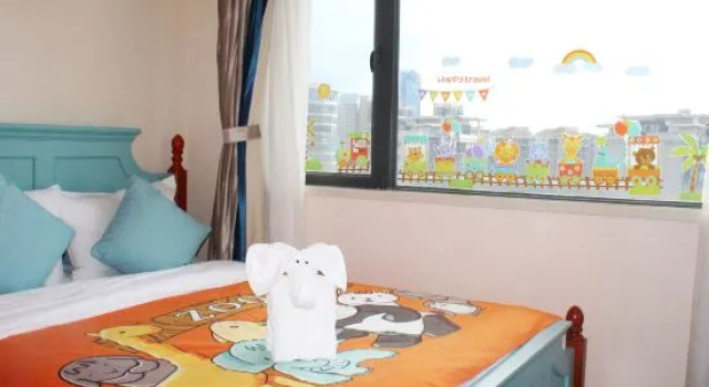 Семейный люкс с 2 комнатами с балконом и с видом на море Evergrande Garden Apartment Hotel Haikou Bay