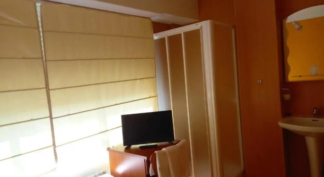Номер Standard Pension San Roque