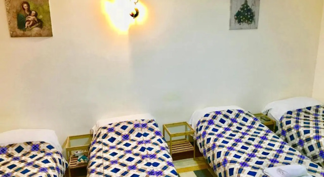 Bett im Wohnheim Pardis Guest house