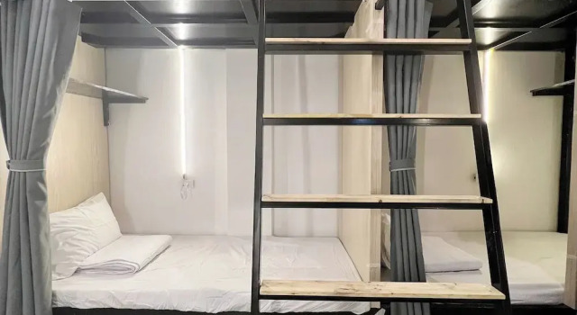 Кровать в общем номере Heritage Corner Hostel