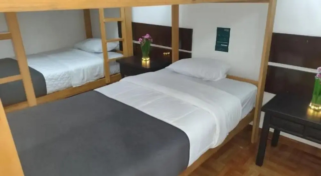 Кровать в общем номере Green Orchid Hostel