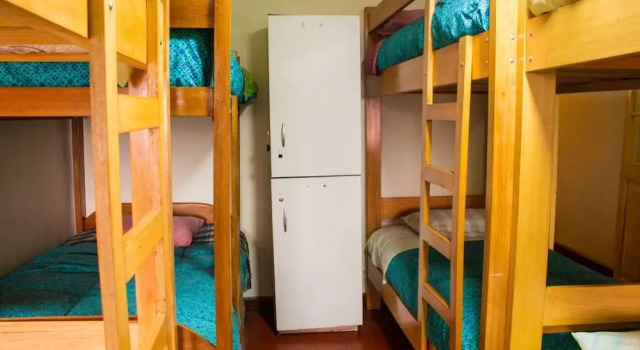 Pat în dormitor La Chola Hostel