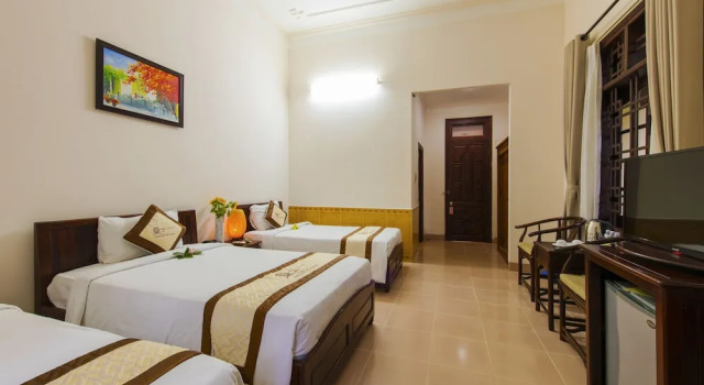 Трёхместный номер Deluxe с балконом и с красивым видом из окна Bach Dang Hoi An Hotel