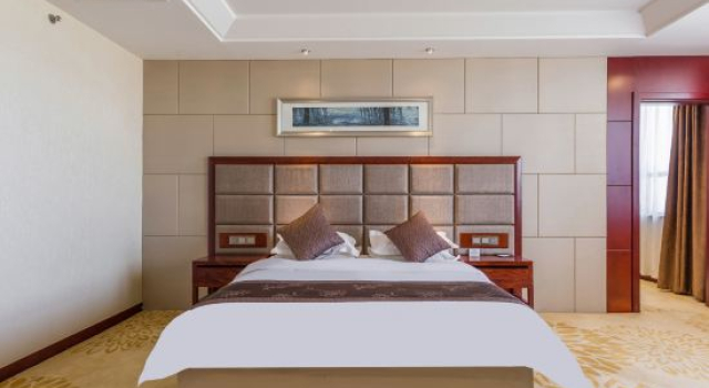 Люкс Deluxe Wanzhou Loulan Hotel