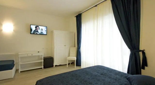 Четырёхместный номер Standard Atlantis Inn Roma