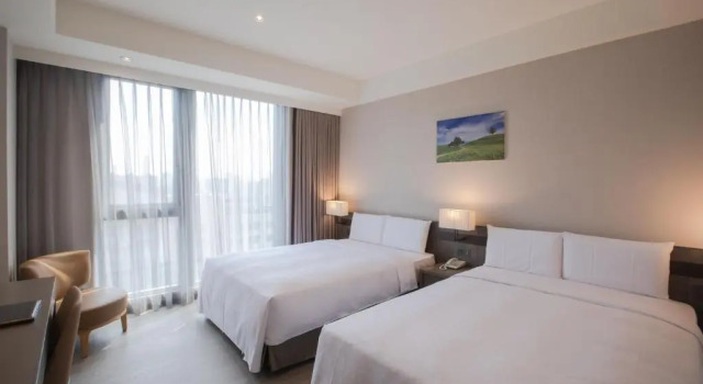 Номер Economy Jin Shi Hu Hotel