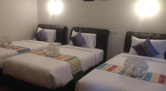 Трёхместный номер Deluxe Hugpua Hotel
