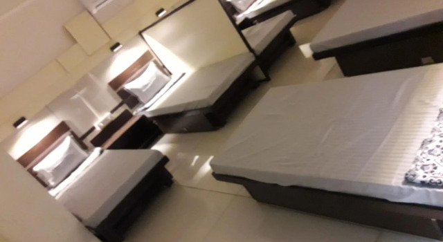 Кровать в общем номере night-halt dormitory