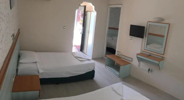Четырёхместный номер Standard Uyum Hotel