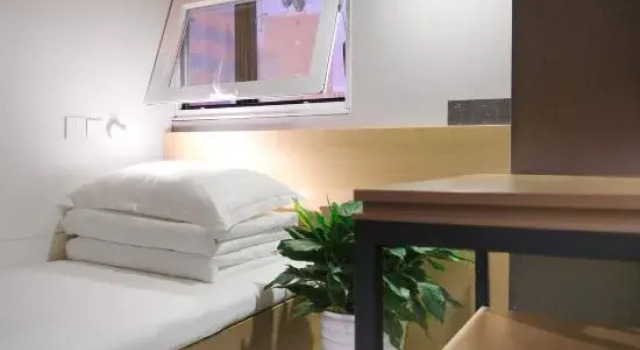 Кровать в общем номере (мужской номер) wohkoon ZheXingSun Hotel (Beijing Sanyuanqiao Yansha Embassy District Branch)