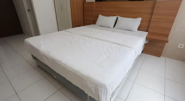 Deluxe room Collection O metroploitian park Serviced Apartmen