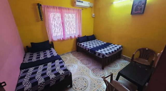 Økonomi- dobbelt værelse med altan med haveudsigt Vailankani guest house