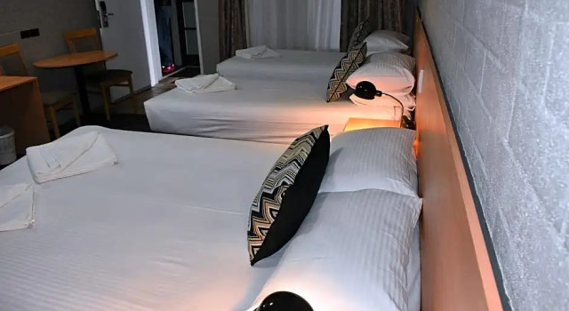 Семейный номер Deluxe Coachmans Inn Motel