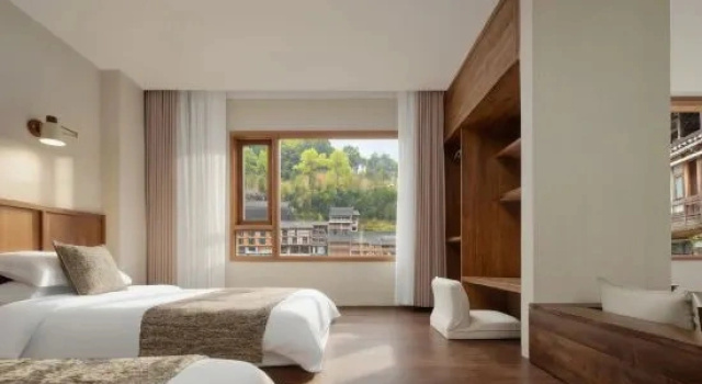 Люкс с 2 комнатами Sishi Four Seasons Homestay