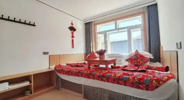 Кровать в общем номере Wuchang Snow Valley Jiaxin Inn