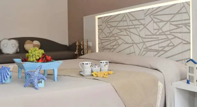 Четырёхместный номер Deluxe с балконом Hotel Maioli B&B