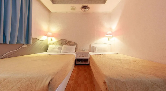 Трёхместный семейный номер Standard Dajenshan Hotel