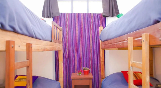 Кровать в общем номере Casa Blanca Hostel