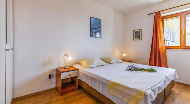 Апартаменты Цокольный этаж с 2 комнатами Apartment Lorencin Milka