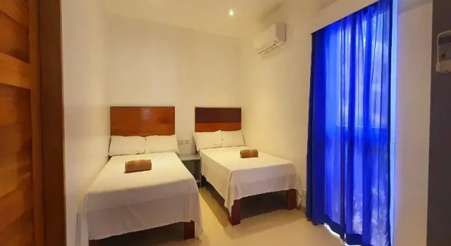 Вилла с балконом и рядом с пляжем Pili Beach Resort Agmanic