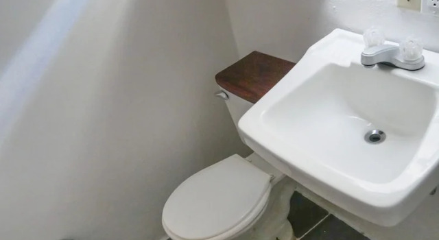 Кровать в общем номере Drift Inn Cayo
