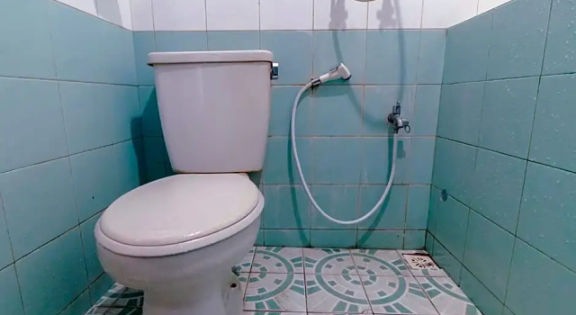 Номер Deluxe OYO 1996 Koneng Hotel