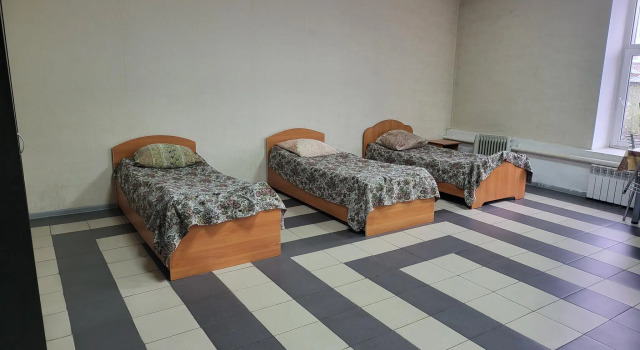 Кровать в общем номере Тура