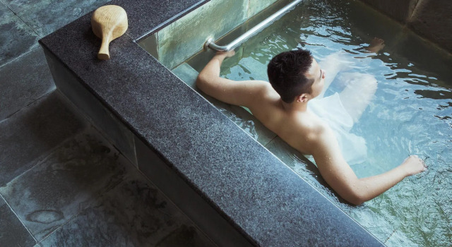 Кровать в общем номере Muen Hot Spring Hotel