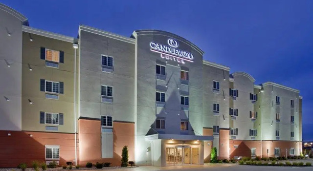 Кровать в общем номере Candlewood Suites Kansas City Northeast by IHG