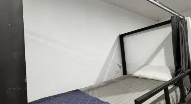 Кровать в общем номере Jungle Backpackers View
