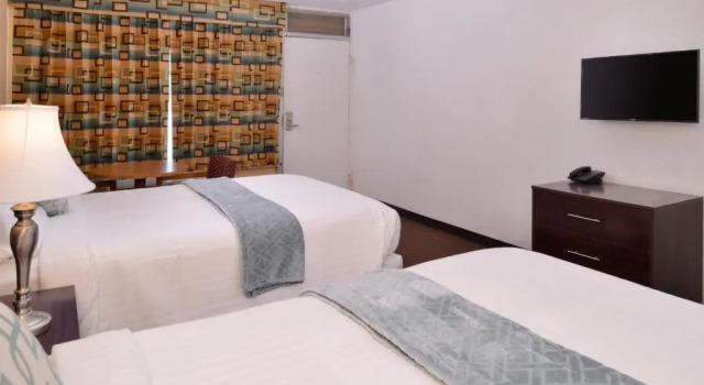 Четырёхместный номер Deluxe Red Carpet Inn Battleboro