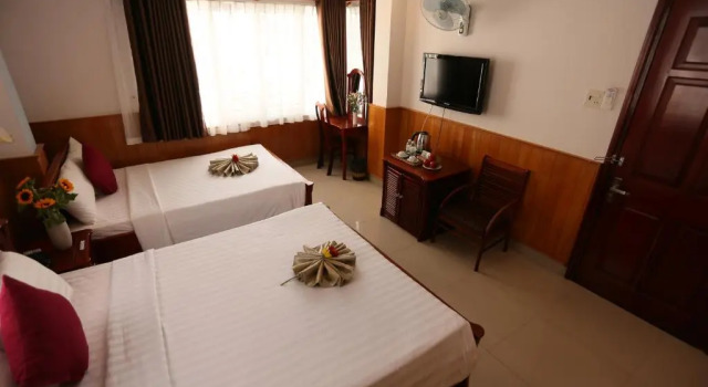 Четырёхместный номер Standard с балконом New Day Hotel