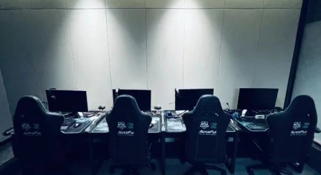 Łóżko w pokoju wieloosobowym Chenzhou Junlong Smart E-Sport Hotel