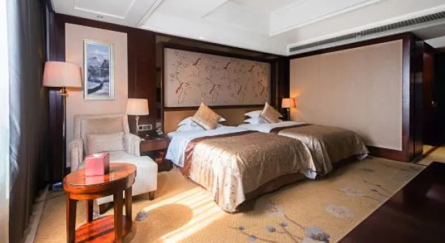 Номер Deluxe Tai Zhou International Jinling Hotel