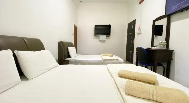 Люкс OYO 90087 Warisan Motel