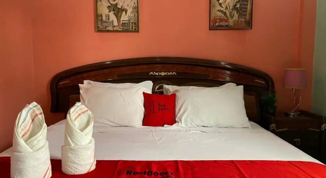 Люкс RedDoorz Plus @ Lhexlyn Resort San Narciso