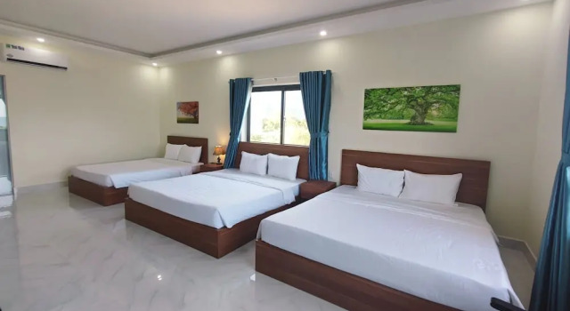 Кровать в общем номере Hoàng Anh Côn Đảo Hotel