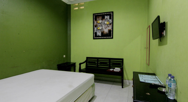 Номер Deluxe Hotel Popi Pondok Pisang