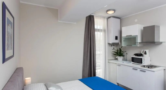 Студия Standard с балконом и с видом на город Apartments ZoomZoom