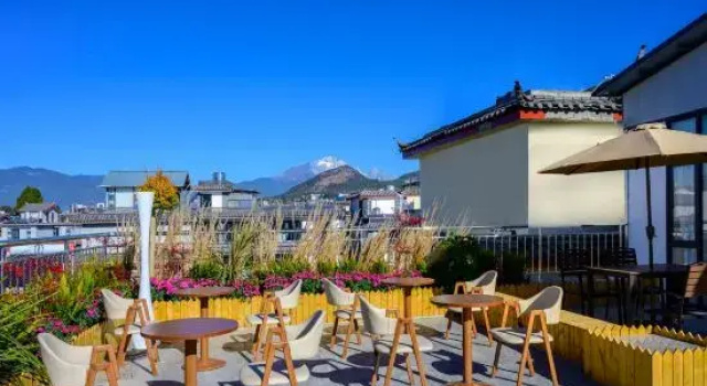 MuShan Garden Qieman: Free luggage pick-up at Lijiang Ancient City Gate, Prenota Hotel Hotel a Yunnan con parcheggio, Parcheggio