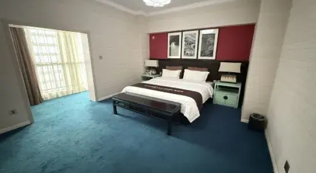 Suite familiare Deluxe World Trade Hotel (Luoyang Longmen High-speed Railway Station Sports Center)