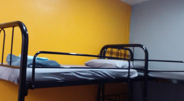 Кровать в общем номере LOFT WATERFRONT KUCHING SARAWAK