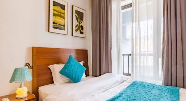 Семейный люкс с 3 комнатами с балконом There is a boutique holiday B & B in Xishuangbanna
