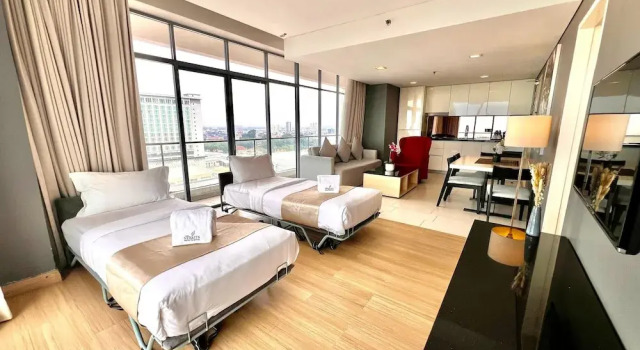Четырёхместный семейный номер Standard с видом на город ASIA MELAKA HOTEL managed by The Straits Hotel & Suites 马六甲亚逸酒店