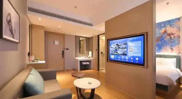 Люкс Deluxe Magnotel Business Hotel (Mudanjiang Railway Station Beian Road)