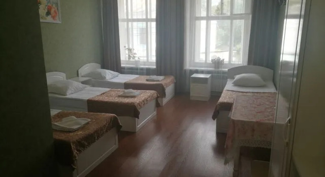 Кровать в общем номере Русь