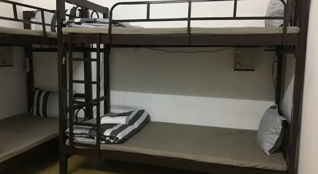 Кровать в общем номере Condodo Hostel